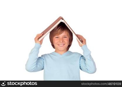Preteen boy with a big book oh his head isolated on white background