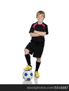 Preteen with a uniform for play soccer stepping the ball isolated on white background