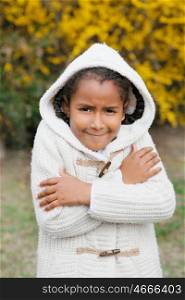 Pretty African American Girl warm with a coat and hood