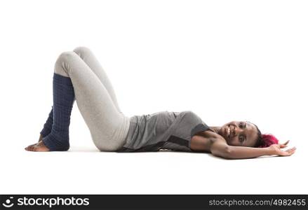 Pretty african girl wearing sport clothes resting after workout isolated on white background
