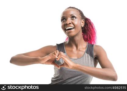 Pretty african girl wearing sport clothes showing heart sign isolated on white background