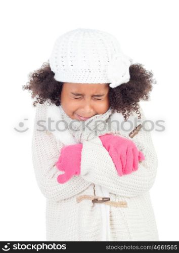 Pretty african girl with gesture of being cold and warm clothing isolated on a white background