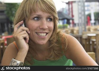 pretty blond girl talking on the phone