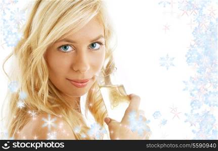 pretty blond with glass of champagne surrounded by rendered snowflakes