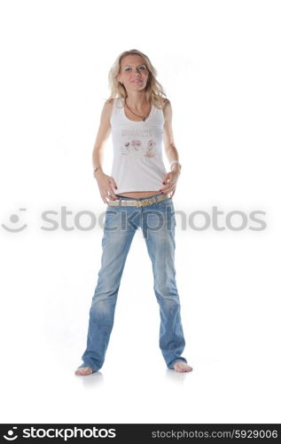 pretty blond women on white background. Weared in jeans and white shirt. pretty blond women on white background