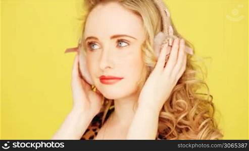 Pretty blonde girl with headphones