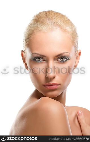 pretty blonde girl with naked shoulders, she looks in to the lens with sensual expression and her right hand is near the left shoulder