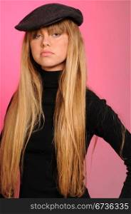 Pretty blonde teenage girl dressed in black