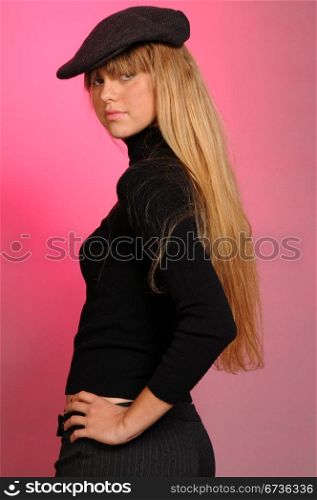 Pretty blonde teenage girl dressed in black