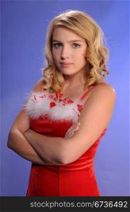 Pretty blonde teenager in a Santa&rsquo;s helper outfit