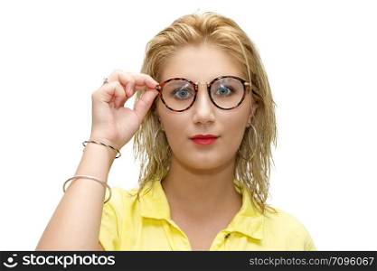 pretty blonde woman dressed in yellow with glasses on a white background