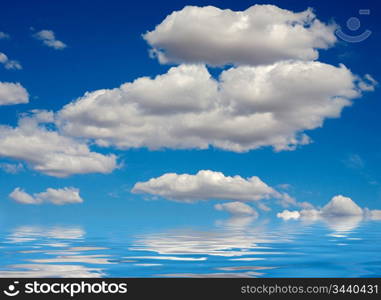 pretty blue sky reflected in the water