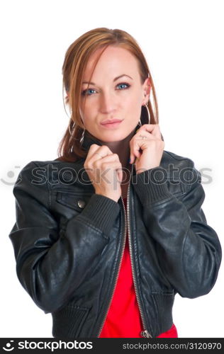 Pretty brunette wearing a leather jacket and a red dress.