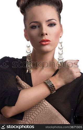 pretty brunette with dark shirt and bag, she looks in to the lens with sensual expression and has the bag under the right arm