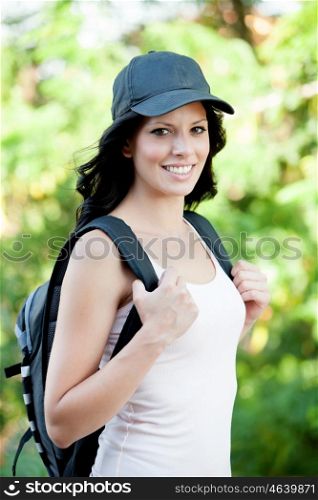Pretty brunette woman hiking in her spare time