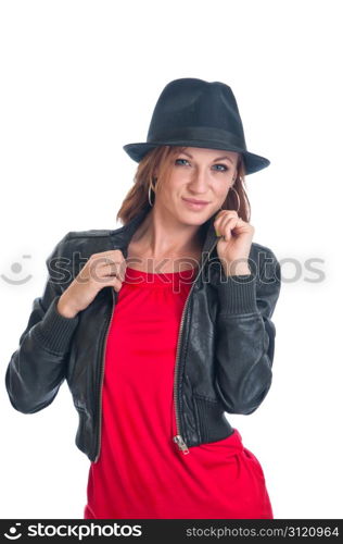 Pretty brunette woman in a red dress, leather jacket and black felt fedora.