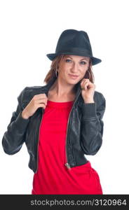 Pretty brunette woman in a red dress, leather jacket and black felt fedora.