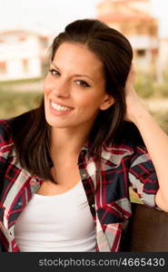 Pretty brunette woman in autumn outside