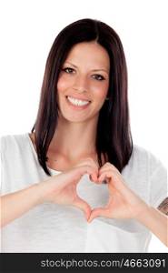 Pretty brunette woman in love making the shape of a heart with his hand isolated on white