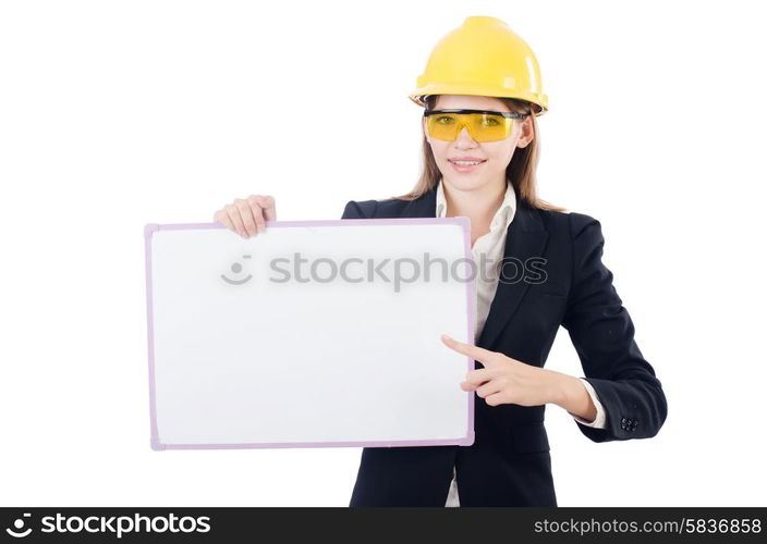 Pretty businesswoman with hard hat and blank board isolated on white