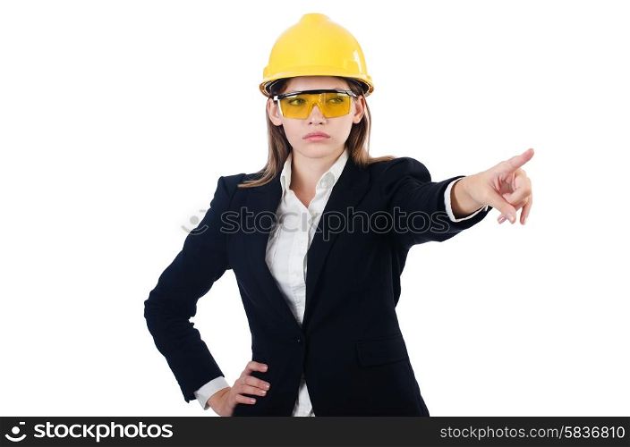 Pretty businesswoman with hard hat pressing virtual buttons isolated on white