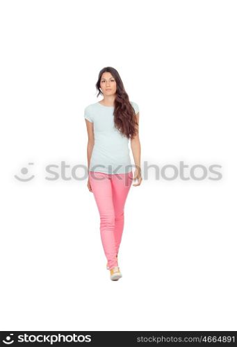 Pretty casual girl walking isolated on a white background