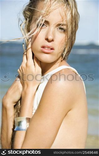 Pretty Caucasian blond woman on Maui, Hawaii beach.