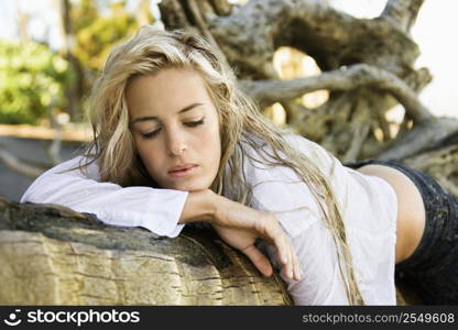 Pretty Caucasian woman posing on Maui, Hawaii beach.