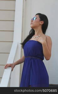 Pretty Chinese girl in a blue dress