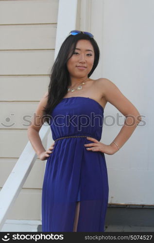 Pretty Chinese girl in a blue dress