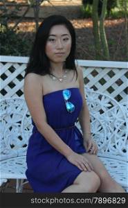 Pretty Chinese girl in a blue dress