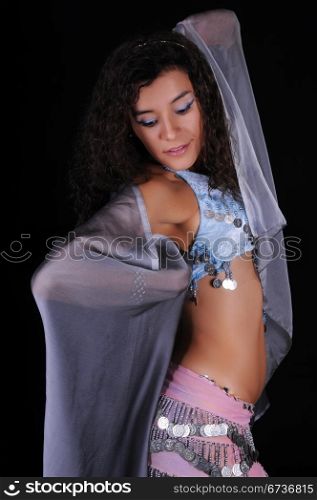 Pretty Colombian woman in belly dancing costume