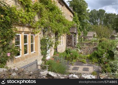 Pretty cottage gardens, Lower Slaughter, Gloucestershire, England.