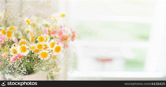 Pretty daisies bunch at window, floral background