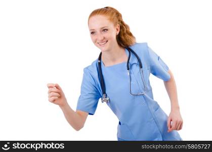 Pretty doctor in blue uniform in motion isolated on white