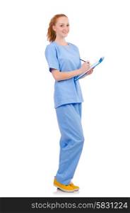 Pretty doctor in blue uniform making notes isolated on white