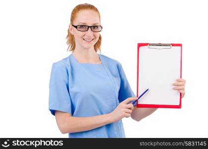 Pretty doctor in blue uniform showing notes isolated on white