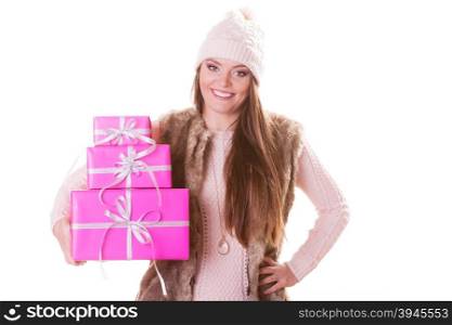 Pretty fashion woman with boxes gifts. Christmas.. Pretty happy fashion woman in hat with pink rose boxes gifts isolated on white. Christmas xmas winter time season concept.