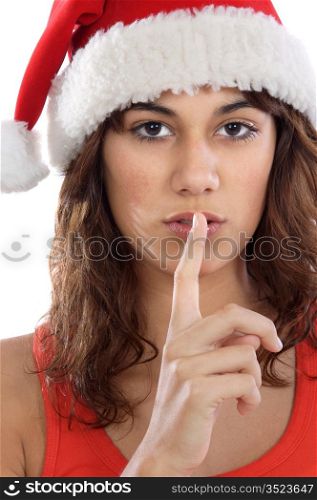 pretty girl asking silence with her finger