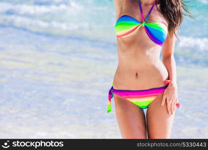 Pretty girl at the beach. Pretty slim girl at tropical sea beach