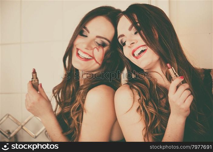 Pretty girl having fun in bathroom. Pretty girl having fun in bathroom. Funny concept during makeup. Draw of heart. Retro style