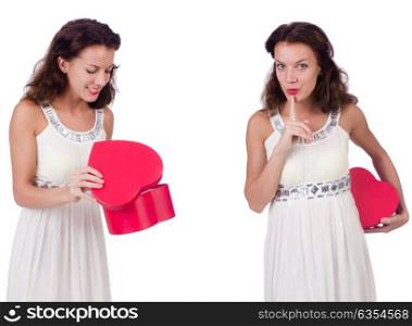 Pretty girl holding gift box isolated on white