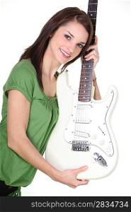 Pretty girl holding guitar