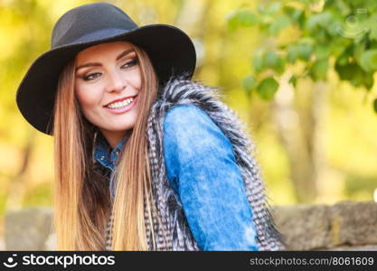 Pretty girl in park. Fashion and style of female. Attractive and fashionable woman outdoor. Portrait of charming young lady resting on air in park.