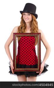 Pretty girl in red polka dot dress with picture frame isolated on white