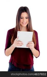 Pretty girl looking at her tablet isolated on white background