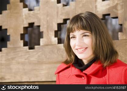 Pretty Girl On The Wooden Background