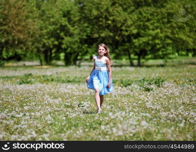 pretty girl spending time in the summer park