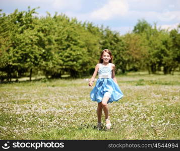 pretty girl spending time in the summer park