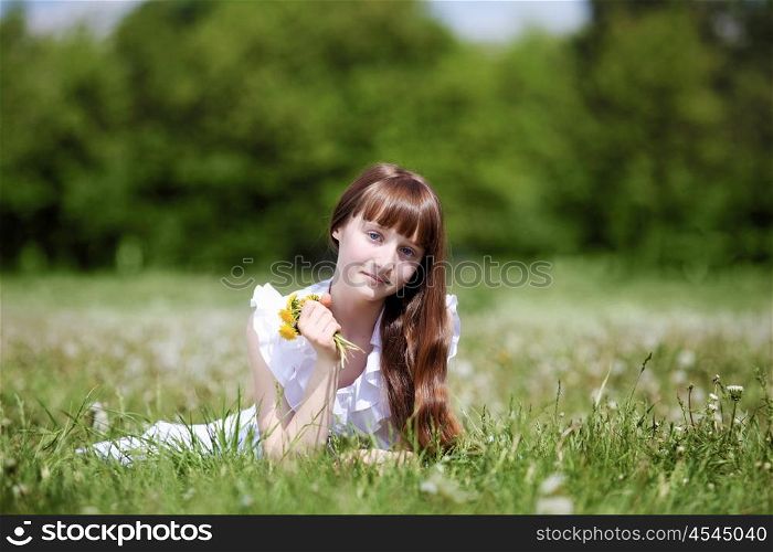 pretty girl spending time in the summer park